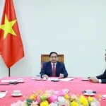 thu tuong pham minh chinh dien dam voi thu tuong singapore 1