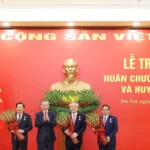 tong bi thu to lam chu tri le trao tang huan chuong quan cong va huy hieu dang 6